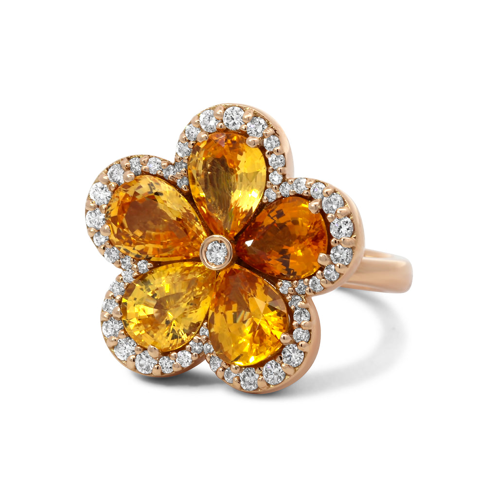 Photograph 1 of 18k Rose Gold Sunshine Sapphire Diamond Flower Ring. Available on DESIGNYARD.com and in our Jewelry Store Dublin, Ireland.