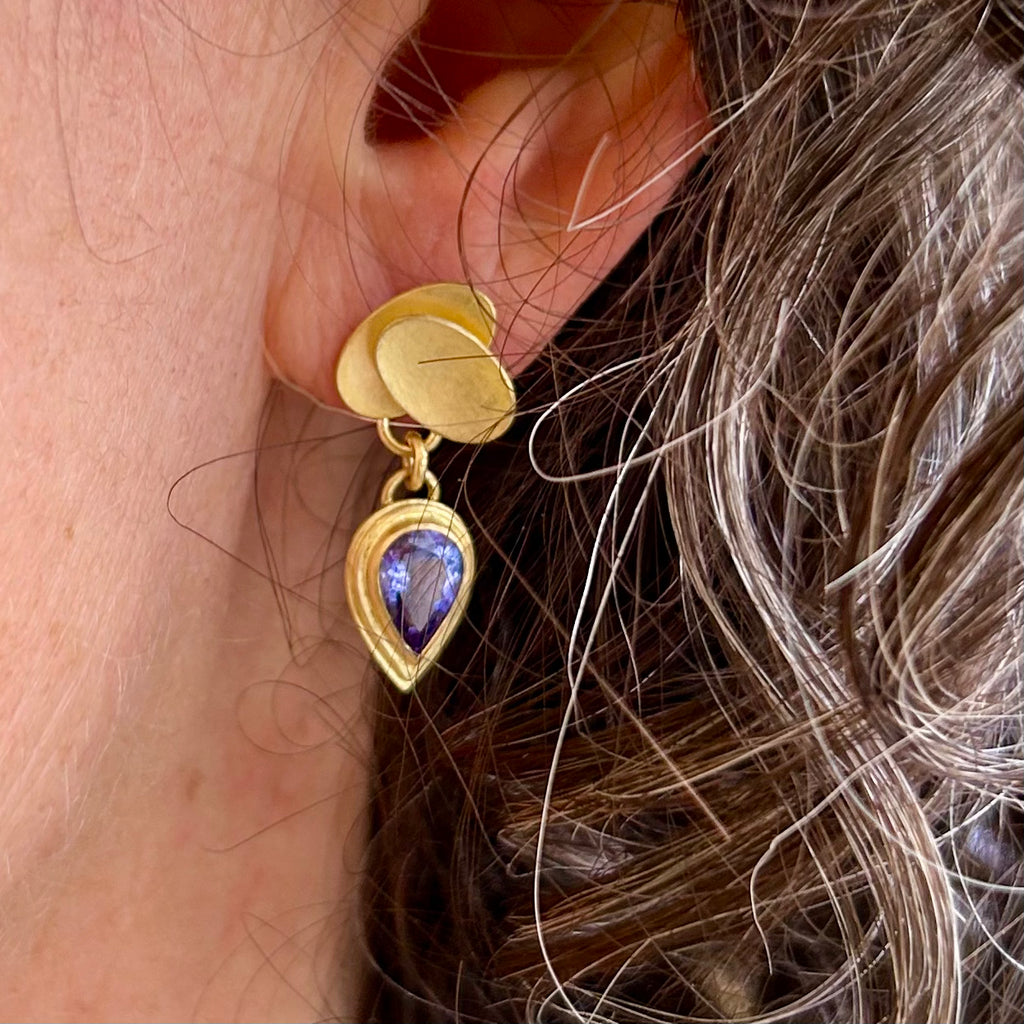 Photograph 2 of Jean-Scott Moncrieff's Contemporary 18k Yellow Gold Double Oval Tanzanite Drop Statement Earrings. Available on DESIGNYARD.com and in our Jewellery Shop Dublin, Ireland. Free Worldwide Shipping with DHL.