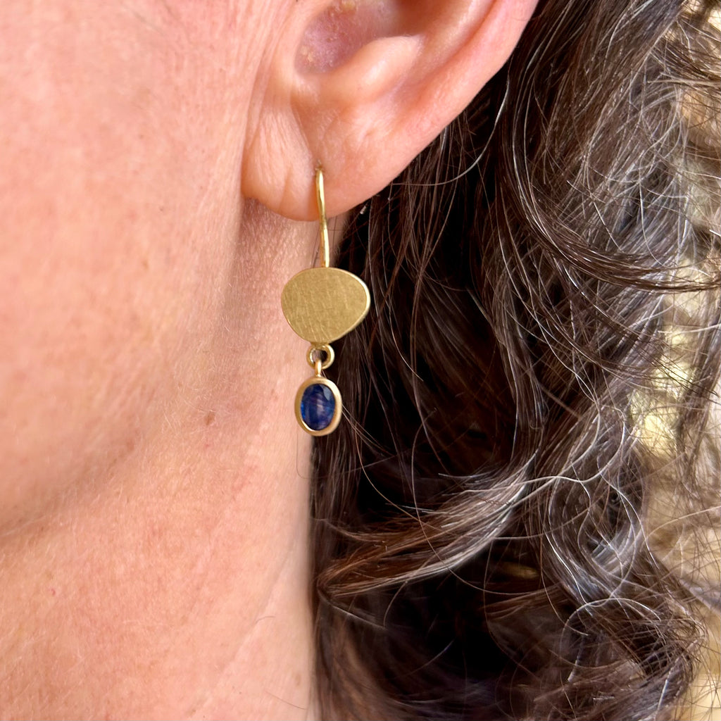 Photograph 2 of Catherine Mannheim's Contemporary 18k Yellow Gold Blue Sapphire Drop Earrings. Available on DESIGNYARD.com and in our Jewellery Shop Dublin, Ireland. Free Worldwide Shipping with DHL.