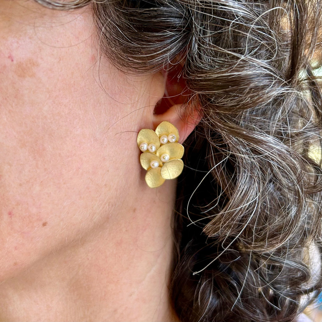 Photograph 2 of Kayo Saito's 18k Yellow Gold Pearl Elderflower Earrings. Available on DESGNYARD.com and in our Jewelry Store Dublin, Ireland. Free Worldwide Shipping with DHL.