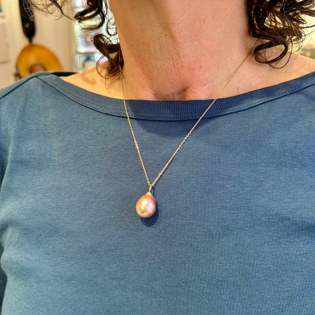 Photograph 3 of Cassie McCann's Contemporary Yellow Gold Freshwater Pink Pearl Pendant. Available on DESIGNYARD.com and in our Jewelry Shop Dublin, Ireland. Free Worldwide Shipping with DHL.