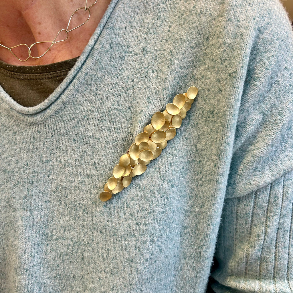 Photograph 2 of Kayo Saito's 18k Yellow Gold Mizukusa Brooch. Available on DESIGNYARD.com and in our Jewellery Shop Dublin, Ireland.