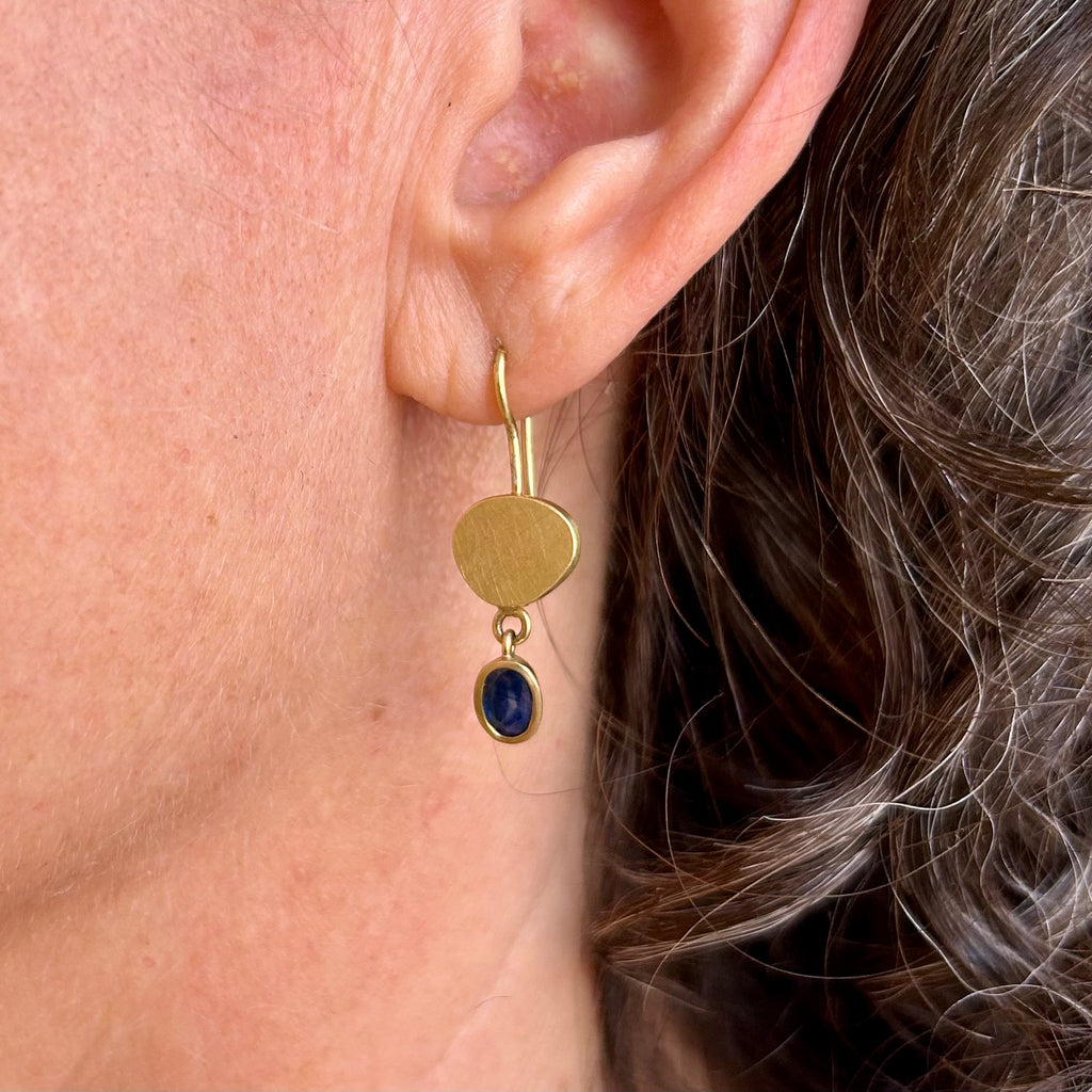 Photograph 3 of Catherine Mannheim's Contemporary 18k Yellow Gold Blue Sapphire Drop Earrings. Available on DESIGNYARD.com and in our Jewellery Shop Dublin, Ireland. Free Worldwide Shipping with DHL.