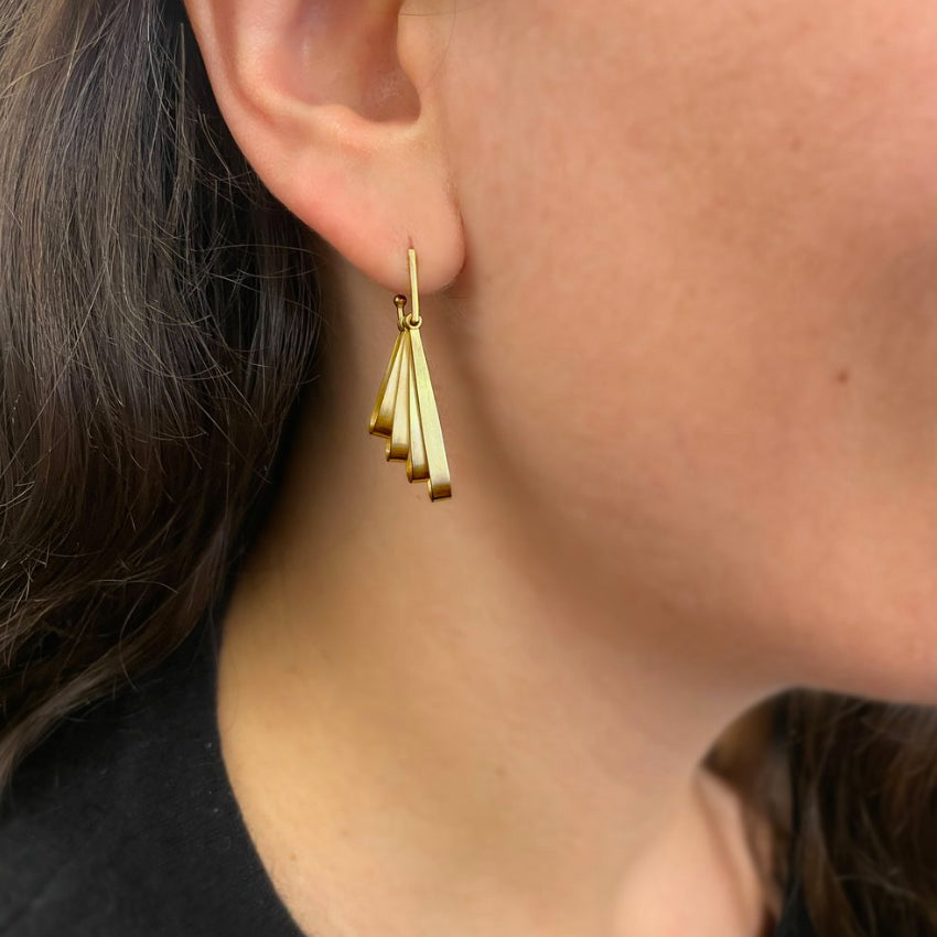 Photograph 2 of Bola Lyon's 18k Yellow Gold Muscle Drop Earrings. Available on DESIGNYARD.com and in our Jewellery Shop Dublin, Ireland.