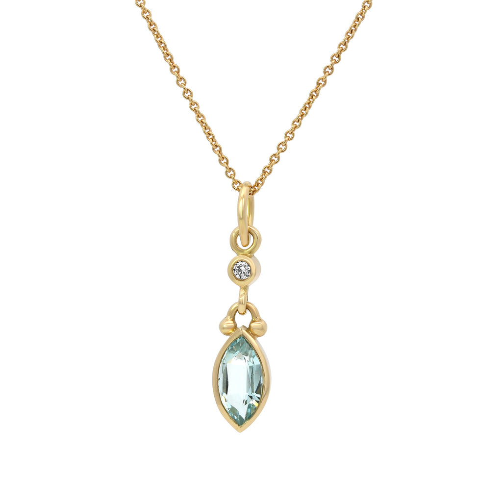 Photograph 1 of Cassie McCann's 18k Yellow Gold Aquamarine Diamond Pendant. Available on DESIGNYARD.com and in our Jewellery Shop Dublin, Ireland.