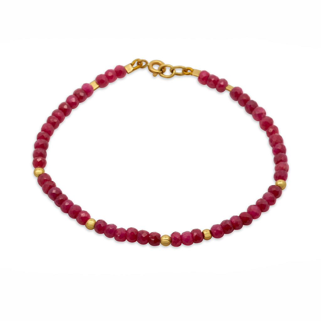 Photograph 1 of Cassie Mc Cann's 18k Yellow Gold Ruby Bracelet. Available on DESIGNYARD.com and in our Jewelry Store Dublin, Ireland.