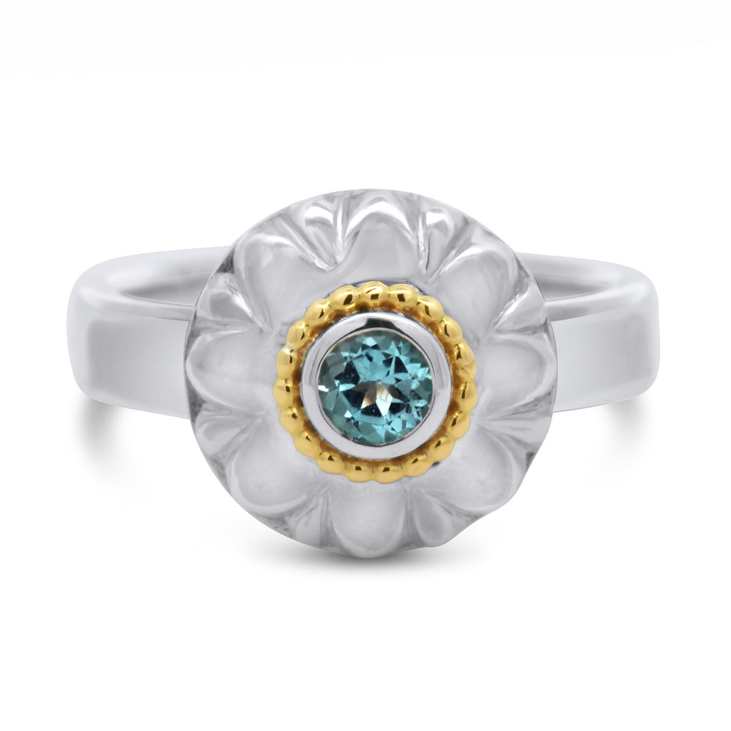 Photograph 1 of Cassie Mc Cann's Contemporary 18k Yellow Gold Silver Blue Topaz Sunflower Ring. Available on DESIGNYARD.com and in our Jewellery Shop Dublin, Ireland. Free Worldwide Shipping with DHL.