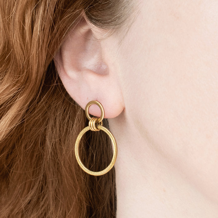 Photograph 2 of Heather O'Connor's Contemporary Silver Yellow Gold Ellipse Circle Drop Earrings. Available on DESIGNYARD.com and in our Jewellery Shop Dublin, Ireland.