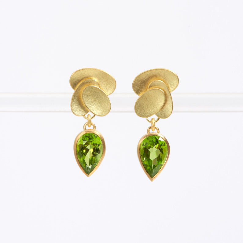 Photograph 1 of Jean Scott-Moncrieff's 18k Yellow Gold Triple Oval Peridot Teardrop Earrings. Available on DESIGNYARD.com and in our Jewellery Shop Dublin, Ireland.