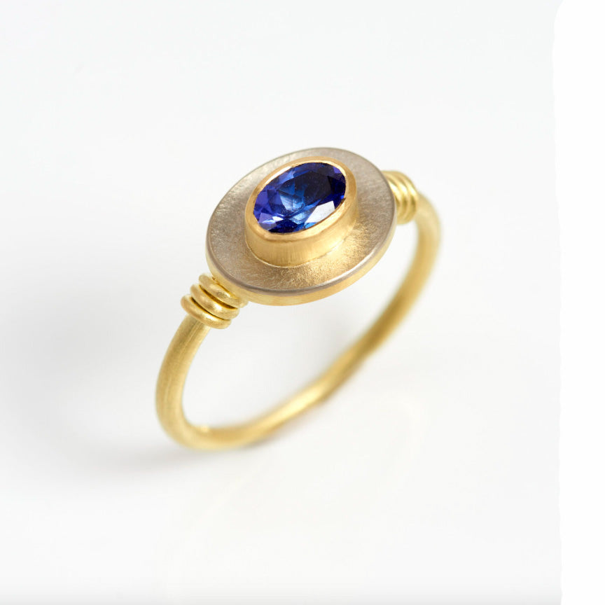 Photograph 1 of Jean Scott Moncrieff's 18k Yellow White Gold Oval Tanzanite Engagement Ring. Available on DESIGNYARD.com and in our Jewelry Store Dublin, Ireland.