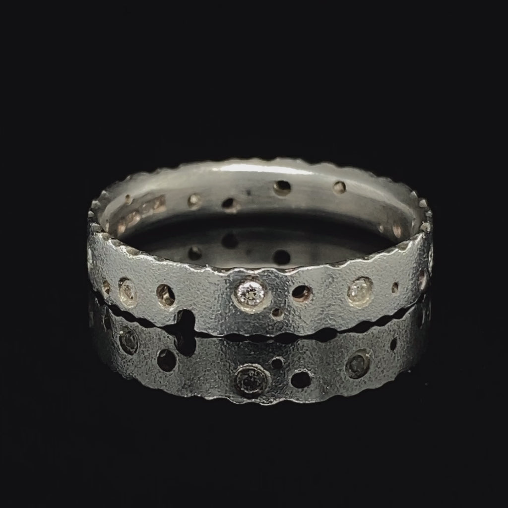 Video of Kate Smith's Contemporary Sterling Silver 8 Scattered Diamond Eternity Ring. Available on DESIGNYARD.com and in our Jewellery Shop Dublin, Ireland. Free Worldwide Shipping with DHL.