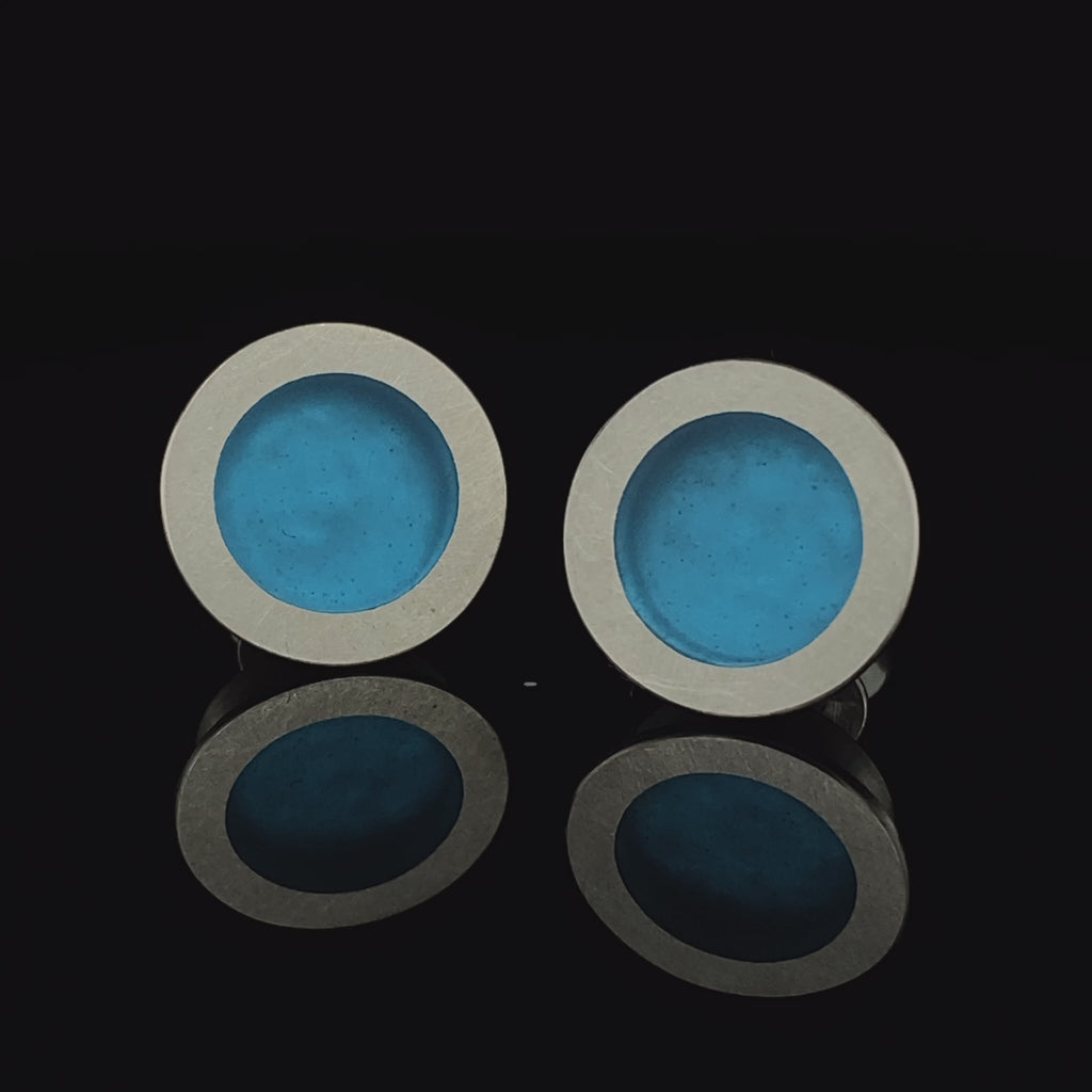 Video of Monika Jakubec's Contemporary Silver Petrol Blue Resin Stud Statement Earrings. Available on DESIGNYARD.com and in our Jewellery Shop Dublin, Ireland. Free Worldwide Shipping with DHL.