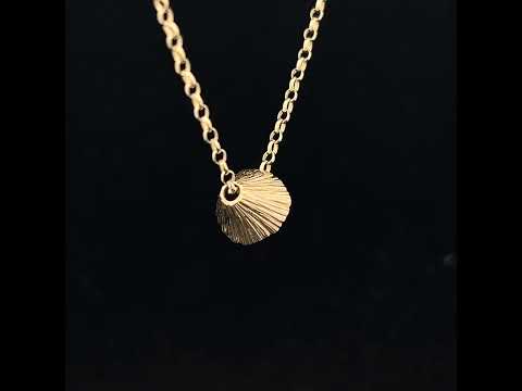 Video of Martina Hamilton's 9k Yellow Gold Shell Cone Small Pendant. Available on DESIGNYARD.com and in our Jewellery Shop Dublin, Ireland.