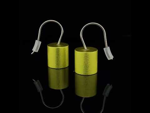 Video of Ursula Muller's Contemporary Lime Green Aluminium Roller Earrings. Available on DESIGNYARD.com and in our Jewellery Shop Dublin, Ireland. Shipping Worldwide.