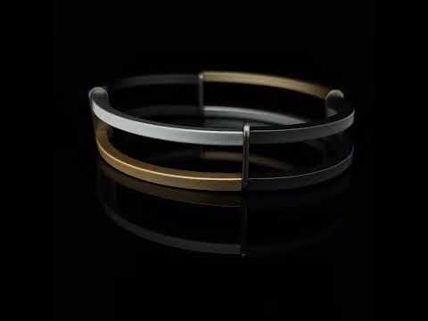 Video of Ursula Muller's Contemporary Gold Grey Silver Structured Steel Aluminium Bracelet. Available on DESIGNYARD.com and in our Jewellery Shop Dublin, Ireland. Worldwide Shipping.