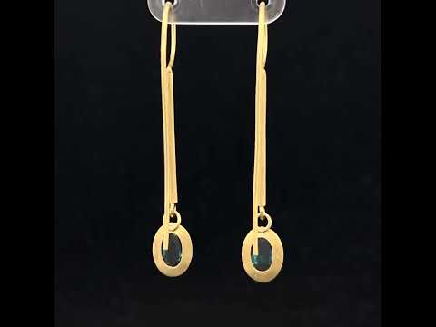 Video of Jean-Scott Moncrieff's Contemporary 18k Yellow Gold Teal Green Tourmaline Drop Statement Earrings. Available on DESIGNYARD.com and in our Jewellery Shop Dublin, Ireland. Free Worldwide Shipping with DHL.