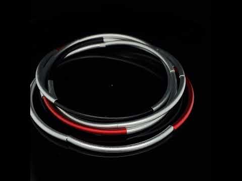 Video of Ursula Muller's Red Silver Black Aluminium Wrap Bracelet. Available on DESIGNYARD.com and in our Jewellery Shop Dublin, Ireland.