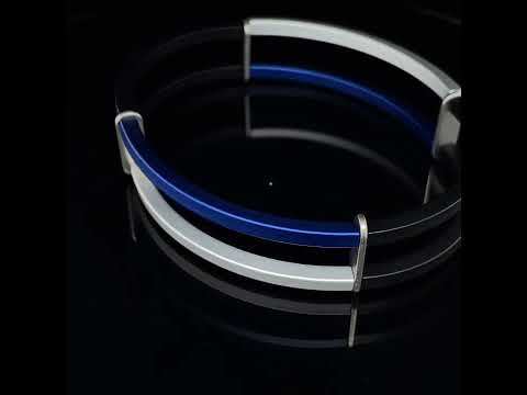 Video of Ursula Muller's Contemporary Grey Blue Structured Steel Aluminium Bracelet. Available on DESIGNYARD.com and in our Jewelry Store Dublin, Ireland.