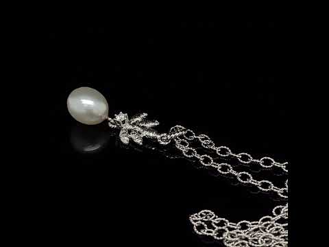 Video of Brigitte Adolph's Elegant 18k White Gold Marilu Pearl Diamond statement Pendant. Available on DESIGNYARD.com no 1 for contemporary jewellery Dublin Ireland.