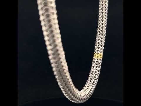 Video of Alison Evans's Titanium 18k Yellow Gold Tube Statement Necklace. Available on DESIGNYARD.com and in our Jewellery Shop Dublin, Ireland.