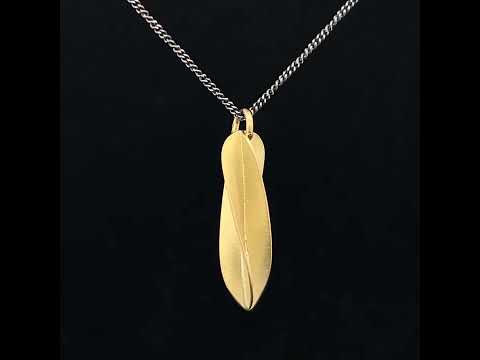 Video of Jean-Scott Moncrieff's Contemporary 18k Yellow Gold Oxi Silver Twist Drop Pendant. Available on DESIGNYARD.com and in our Jewellery Shop Dublin, Ireland. Free Worldwide Shipping with DHL.