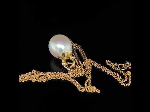 Video of Cassie McCann's 18k Yellow Gold Pearl Athena dainty Pendant. Available on DESIGNYARD.com and in our Jewellery Shop Dublin, Ireland.