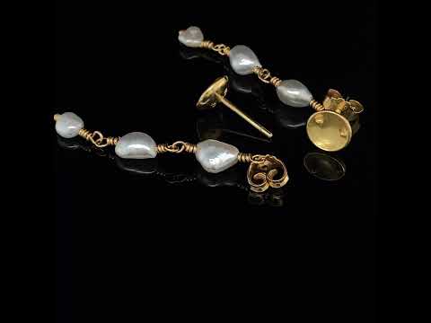 Video of Josephine Bergsøe's Contemporary 18k 22k Yellow Gold Diatom Pearl Drop Earrings. Available on DESIGNYARD.com and in our Jewellery Shop Dublin, Ireland. Free Worldwide Shipping with DHL.