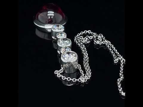 Video of Vintage 18k White Gold Reddish Pink Tourmaline Diamond Pendant. Available on DESIGNYARD.com and in our Jewellery Shop Dublin, Ireland.