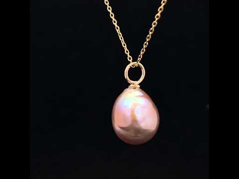 Video of Cassie McCann's 9k Yellow Gold Freshwater Pink Pearl Pendant. Available on DESIGNYARD.com and in our Jewelry Shop Dublin, Ireland.