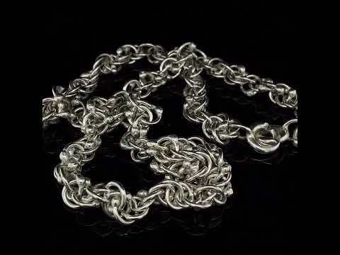 Video of Erik Urbschat's Contemporary Sterling Silver Helix S Statement Necklace. Available on DESIGNYARD.com and in our Jewellery Shop Dublin, Ireland.