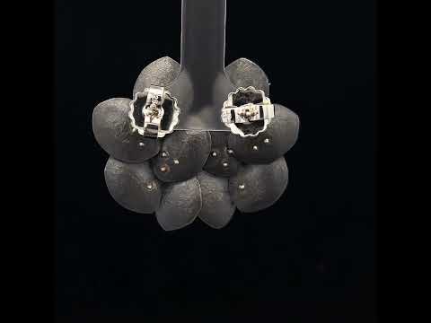 Video of Kayo Saito's Silver Oxidised Black Pearl Elderflower Earrings. Available on DESIGNYARD.com and in our Jewellery Shop Dublin, Ireland.