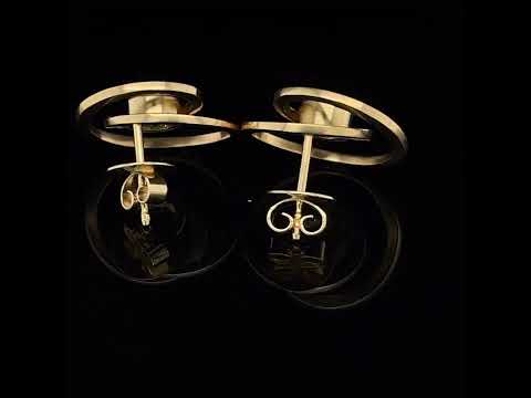 Video of Angela Hubel's Contemporary 18k Rose Gold Peridot Pirouette Statement Earrings. Available on DESIGNYARD.com and in our Jewellery Shop Dublin, Ireland. Free Worldwide Shipping with DHL.