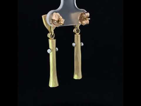 Video of Catherine Mannheim's 18k Yellow Gold Green Tourmaline Pearl Trumpet Earrings, available on DESIGNYARD.com, and in store Dublin Ireland.