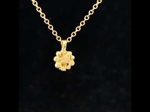 Video of Hannah Bedford's 18k Yellow Gold Diamond Cluster Pendant. Available on DESIGNYARD.com and in our Jewellery Shop Dublin, Ireland.