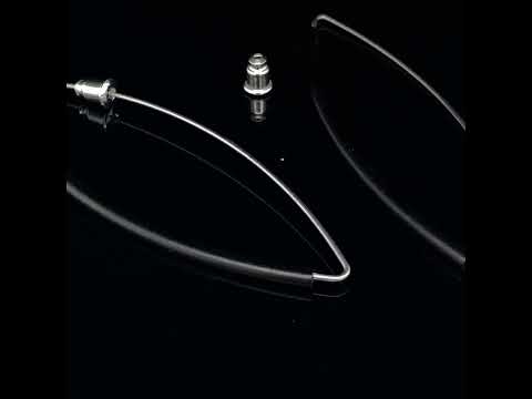 Video of Ursula Muller's Contemporary Black Silver Aluminium Hoop Earrings. Available on DESIGNYARD.com and in our Jewellery Shop Dublin, Ireland. Worldwide Shipping.