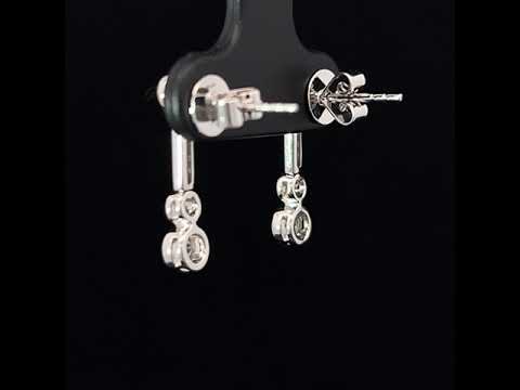 Video of 18k White Gold Linea Diamond Drop Earrings. Available on DESIGNYARD.com and in our Jewelry Store Dublin, Ireland.