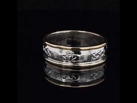 Video of 14k Yellow White Gold Men's Claddagh Wedding Ring. Handmade in Ireland. Available on DESIGNYARD.com and in our Jewelry Store Dublin, Ireland.