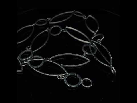 Video of Sophia Epp's Contemporary Silver Oxidised Circle Navette Statement Necklace. Available on DESIGNYARD.com and in our Jewellery Shop Dublin, Ireland. Free Worldwide Shipping with DHL.