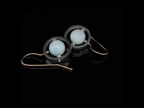 Video of Nicole Van Der Wolf's Contemporary 9k Yellow Gold Silver Aquamarine Ice Rink Statement Earrings. Available on DESIGNYARD.com and in our Jewellery Shop Dublin, Ireland. Free Worldwide Shipping with DHL.