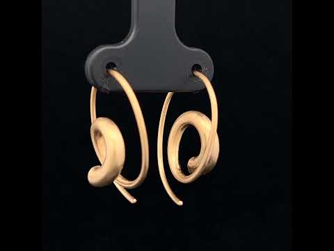 Video of Erik Urbschat's Contemporary 18k Yellow Gold Spiral Statement Earrings. Available on DESIGNYARD.com and in our Jewelry Store Dublin, Ireland.