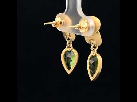 Video of Jean Scott-Moncrieff's 18k Yellow Gold Triple Oval Peridot Teardrop Earrings. Available on DESIGNYARD.com and in our Jewellery Shop Dublin, Ireland.