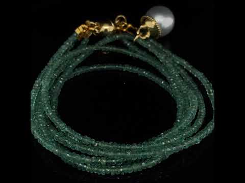 Video of Cassie McCann's Magnificent 18k Yellow Gold Emerald South Sea Pearl Anu Statement Necklace. Available on DESIGNYARD.com Number 1 for Contemporary Jewellery Dublin, Ireland. Free Worldwide Shipping with DHL.