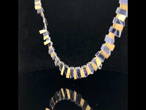 Video of Daphne Krinos's 18k Yellow Gold Iolite Clear Sky Necklace. Available on DESIGNYARD.com and in our Jewellery Shop Dublin, Ireland.