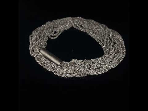 Video of Claudia Milic's Contemporary Designer Sterling Silver Shine Double Bracelet. Available on DESIGNYARD.com and in our Jewellery Shop Dublin, Ireland.