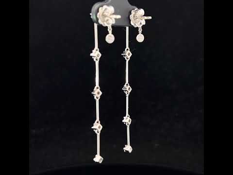 Video of 18k White Gold Rain Drop Long Earrings. Available on DESIGNYARD.com and in our Jewellery Shop Dublin, Ireland.