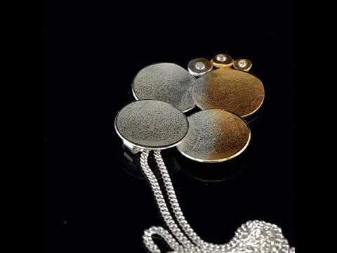 Video of Kokkino's Contemporary Electra Diamond Quad Yellow Gold Silver Pendant. Available on DESIGNYARD.com and in our Jewellery Shop Dublin, Ireland. Free Worldwide Shipping with DHL.