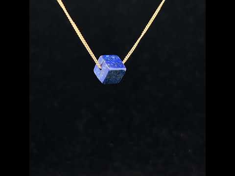 Video of Nicole van der Wolf's Contemporary 9k Yellow Gold Lapis Lazuli Cube Necklace. Available on DESIGNYARD.com and in our Jewellery Shop Dublin, Ireland. Free Worldwide Shipping with DHL.