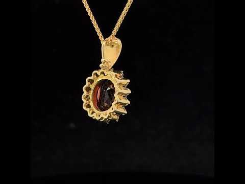 Video of 18k Yellow Gold Diamond Garnet Cluster Pendant. Available on DESIGNYARD.com and in our Jewellery Shop Dublin, Ireland.