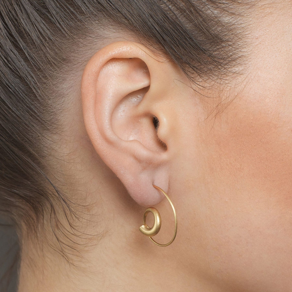 Photograph 2 of Erik Urbschat's Contemporary 18k Yellow Gold Spiral Statement Earrings. Available on DESIGNYARD.com and in our Jewelry Store Dublin, Ireland.