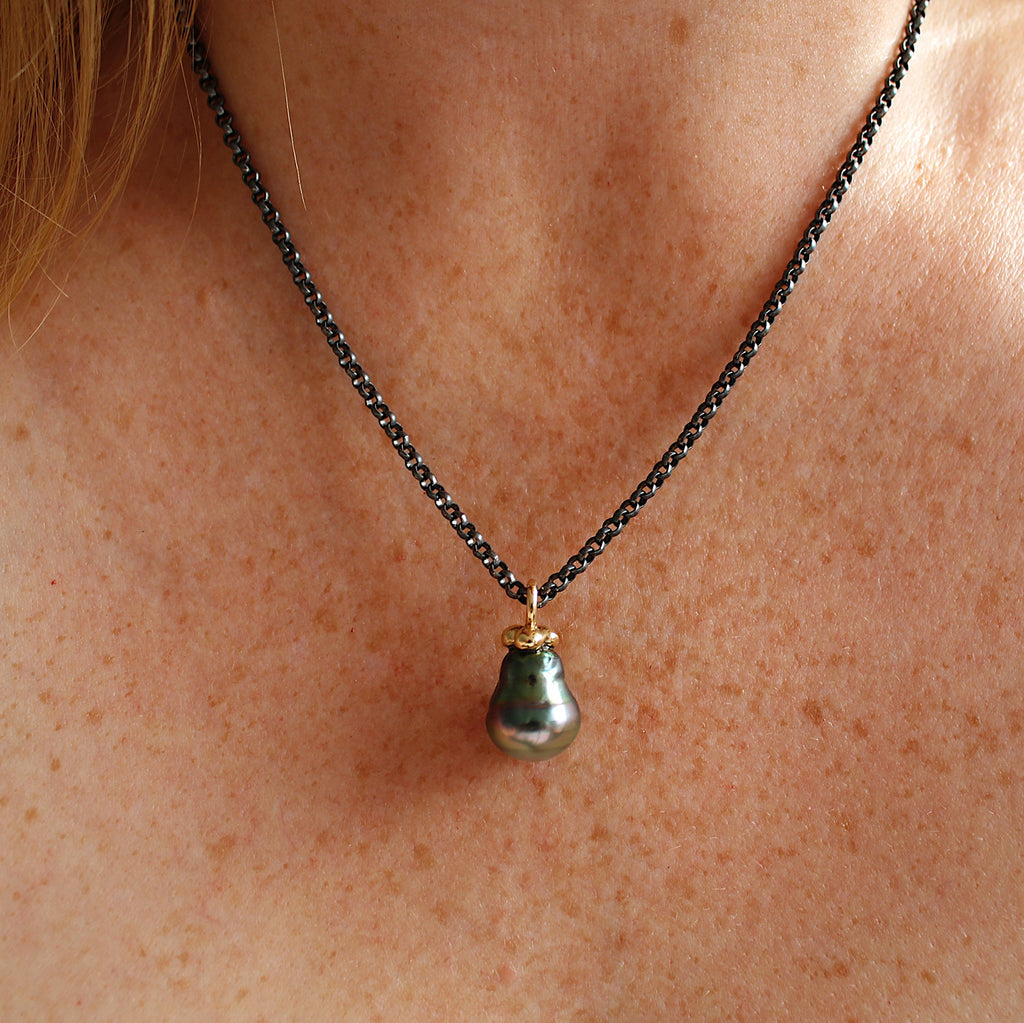 Photograph 3 of Cassie McCann's Irish Made Yellow Gold & Oxidised Silver Baroque Tahitian Pearl Pendant. Available on DESIGNYARD.com and in our Jewellery Shop Dublin, Ireland.